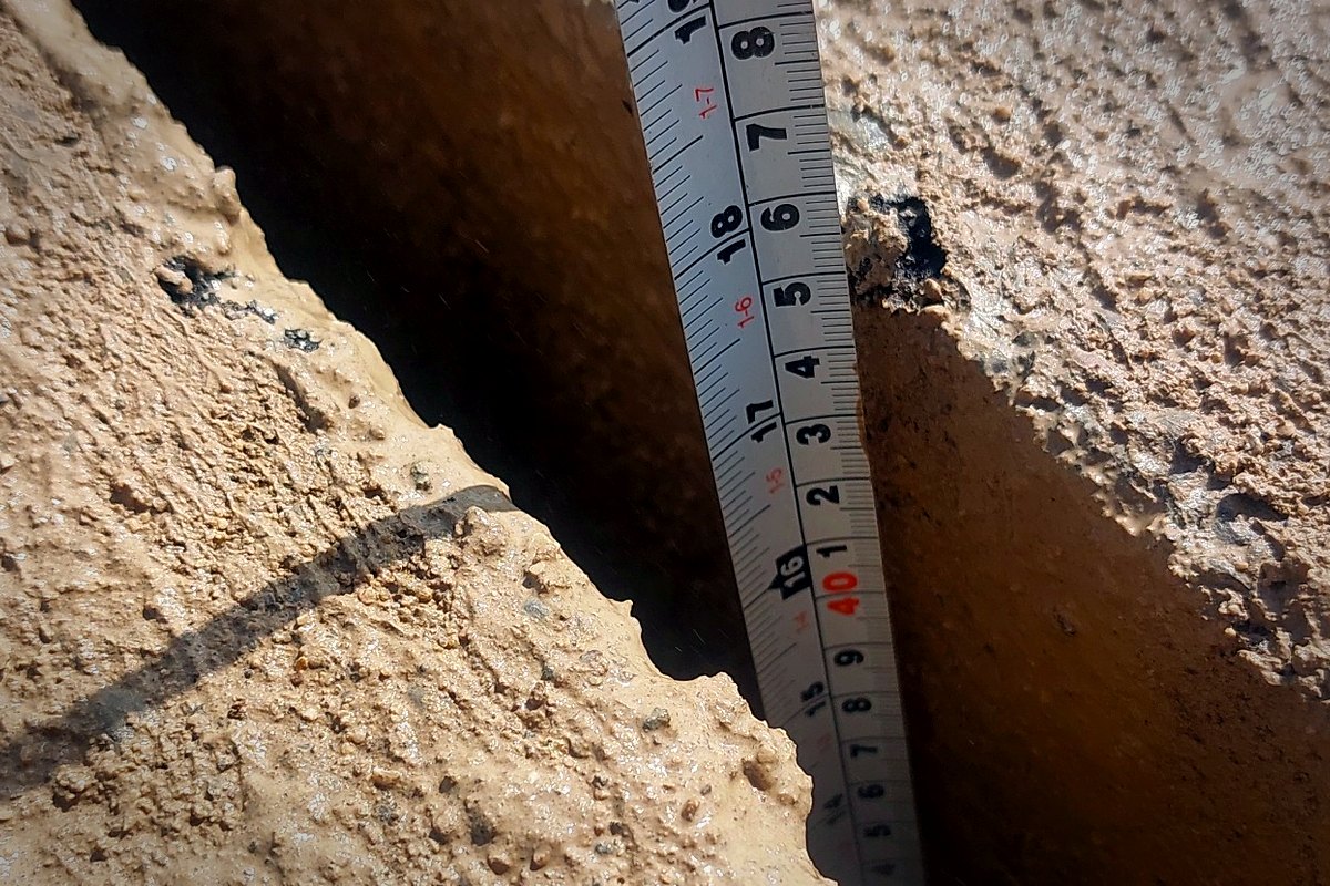 Working depth checked on site with a measuring rule after the blade pass.